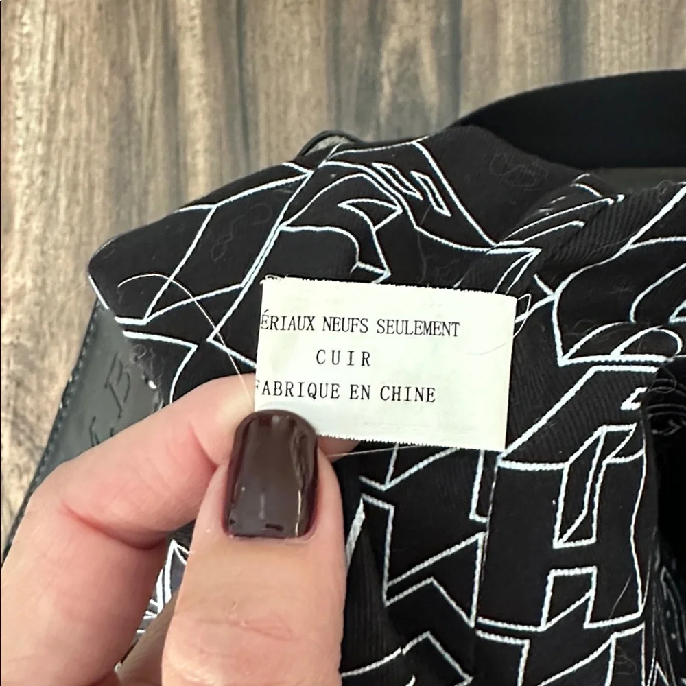 L.A.M.B. Black Leather Bucket Backpack - Picture 9 of 14